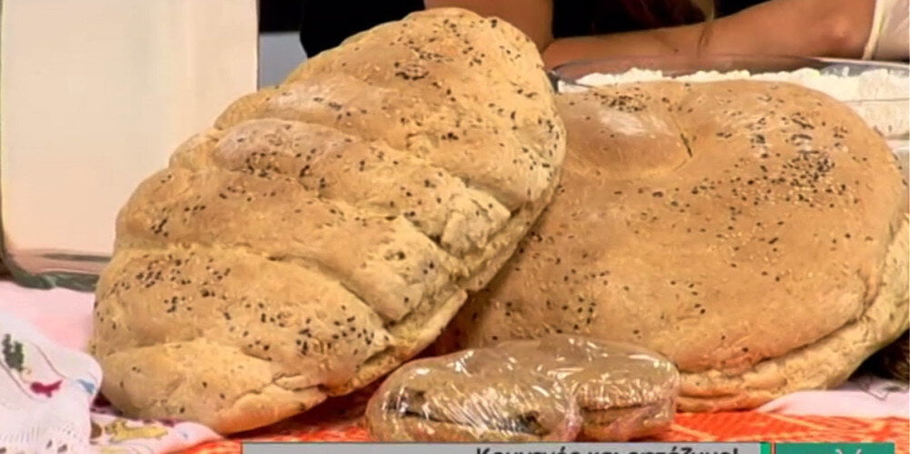 Close-up of Greek ‘Eftazimo’ means bread