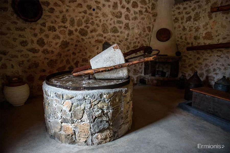 traditional stone olive press at 'Olive Oil Museum, Ermionis Bairaktaris Apiary'