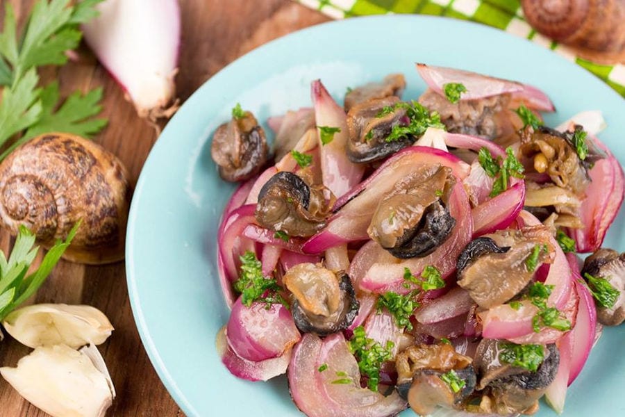 salad with marinate snails and slices of onion and fresh parsley from Escargot de Crete farm