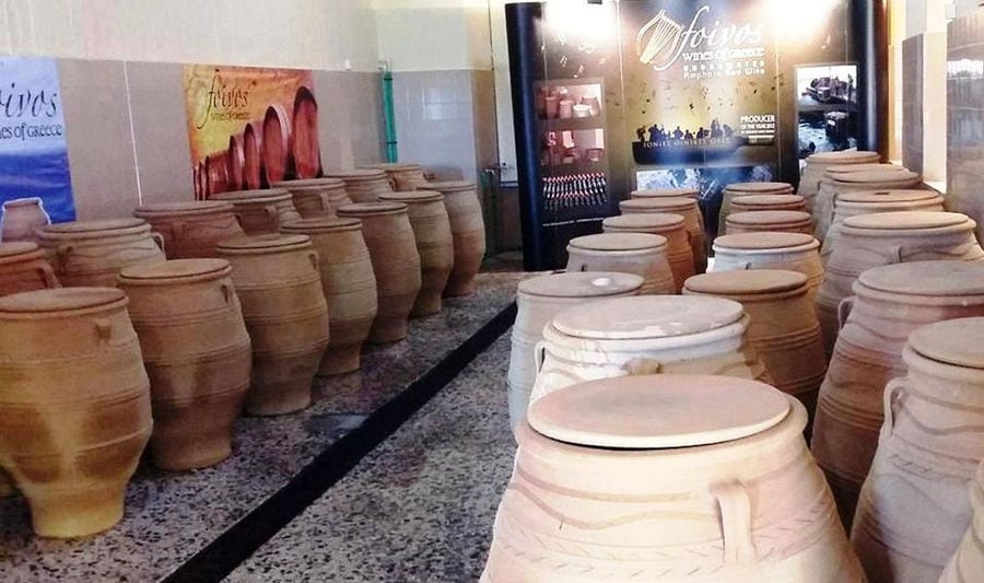 lying wine ceramic amphoras in a row at 'Domaine Foivos' cellar