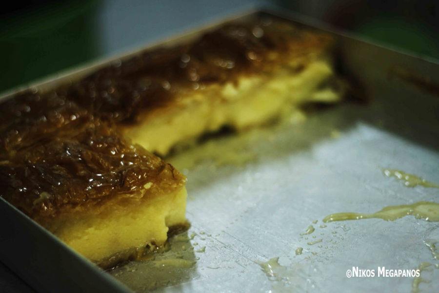 Close-up of pieces of Greek ‘Galaktoboureko’ is sweet made of semolina custard in filo dough covered with syrup