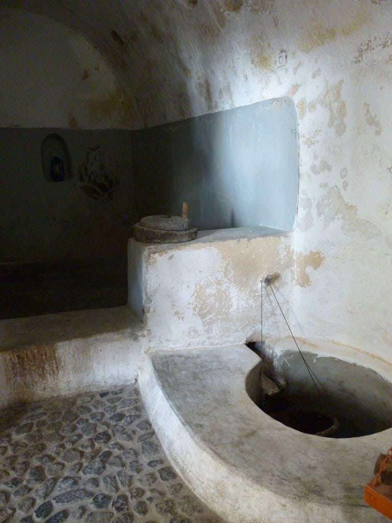 fountain into stone room at Gavalas Winery