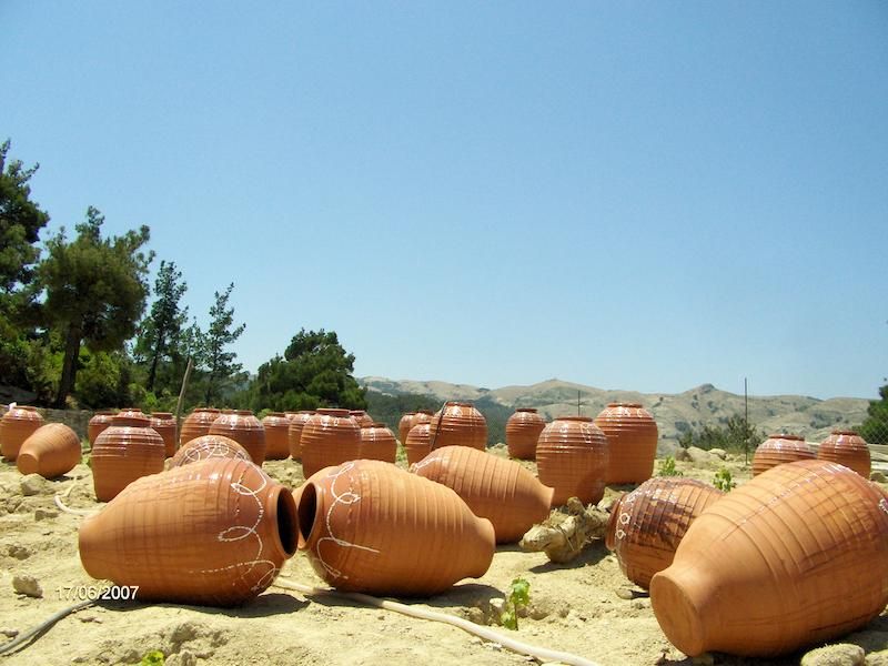 huge, ceramic pots on the ground outside Afianes wines