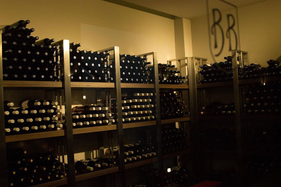 stacked bottles on top of each other in the storage lockers at 'Ktima Biblia Chora' cellar