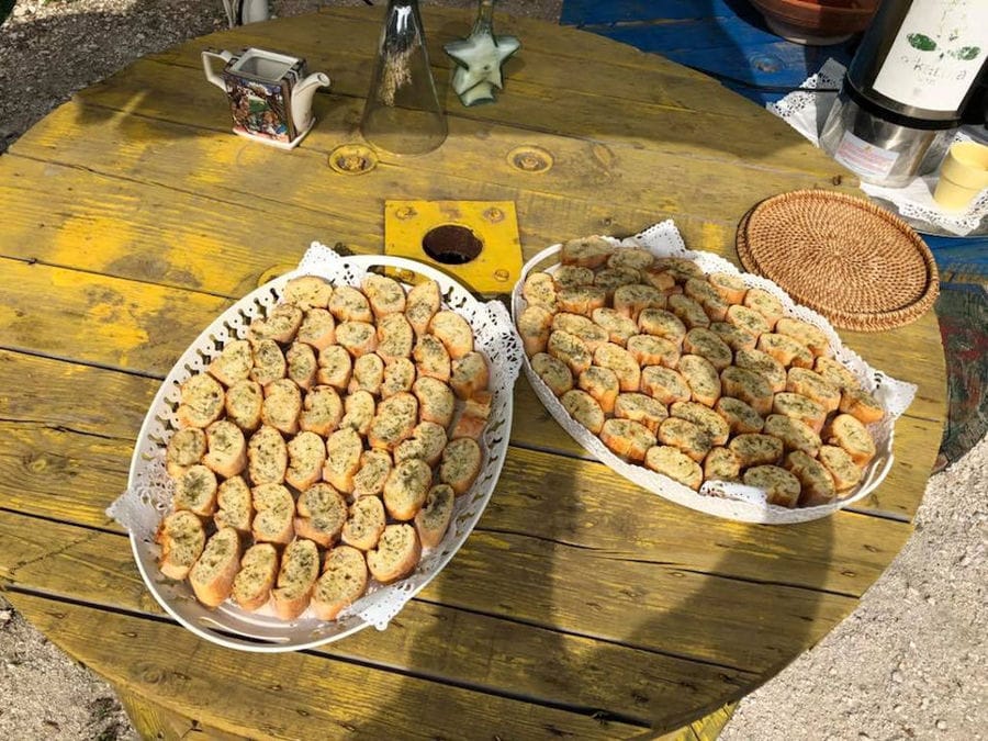 two plateaus with small dry breads on the wood table at Efkarpia Farm