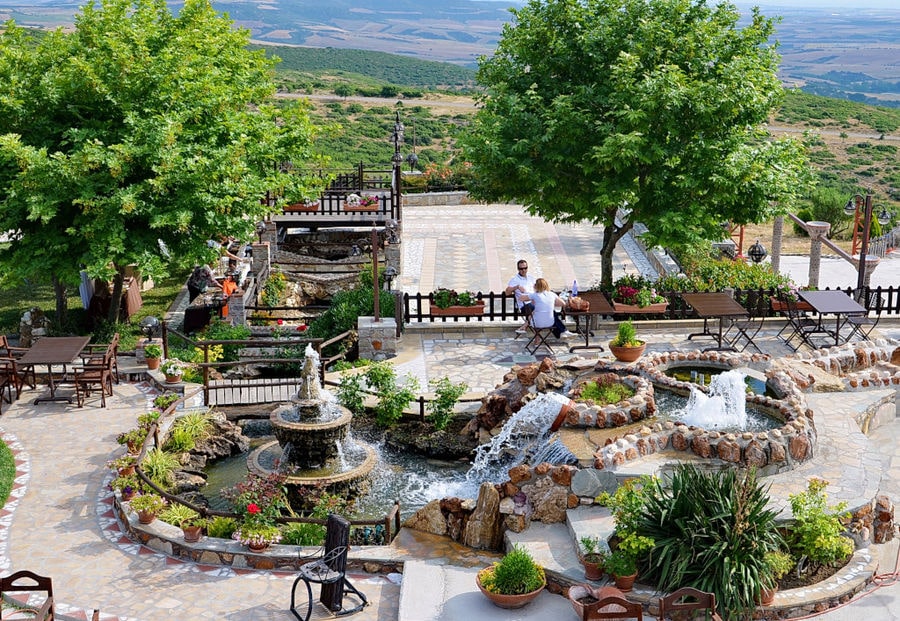 Ktima Perek garden with fountains, trees and pavement