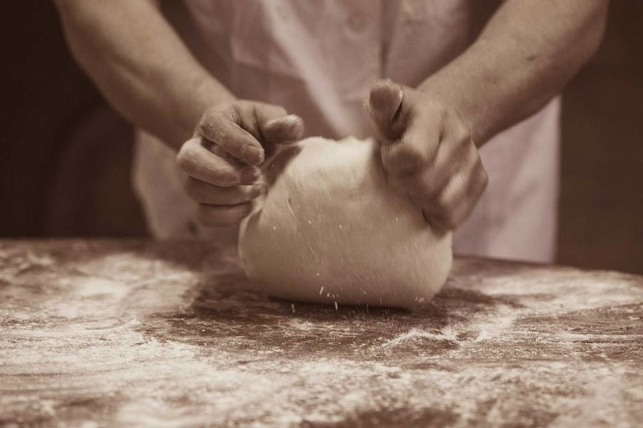 close-up of woman making dough at Ktima Perek workshop