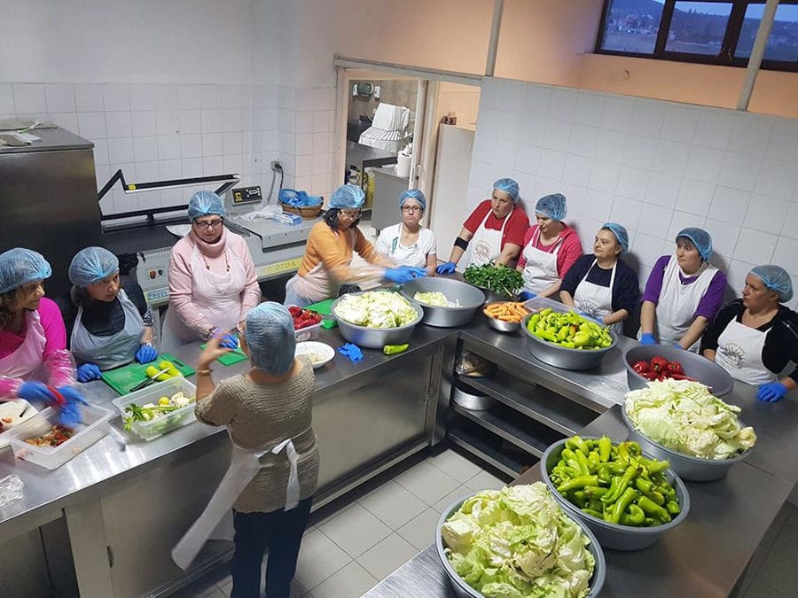 women cooking vegetables at Ktima Perek workshop