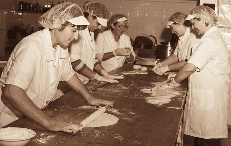 women using wood dough paddles to make pies at Ktima Perek workshop