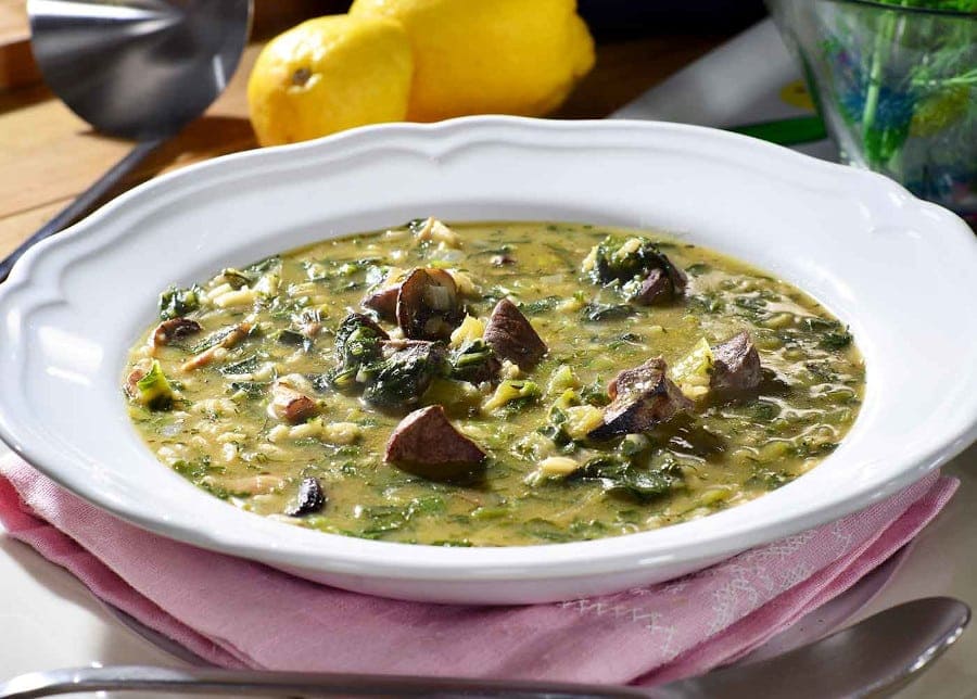 Close-up of plate with Greek ‘Mageiritsa’ is soup cooked with vegetables