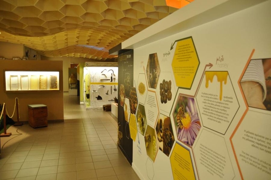 wall with pictures, texts and diagrams regarding beekeeping at 'Melissokomiki Dodekanisou Bee Museum'