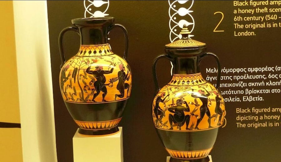 two black figured amphoras dipicting a honey theft scene at 'Melissokomiki Dodekanisou Bee Museum'