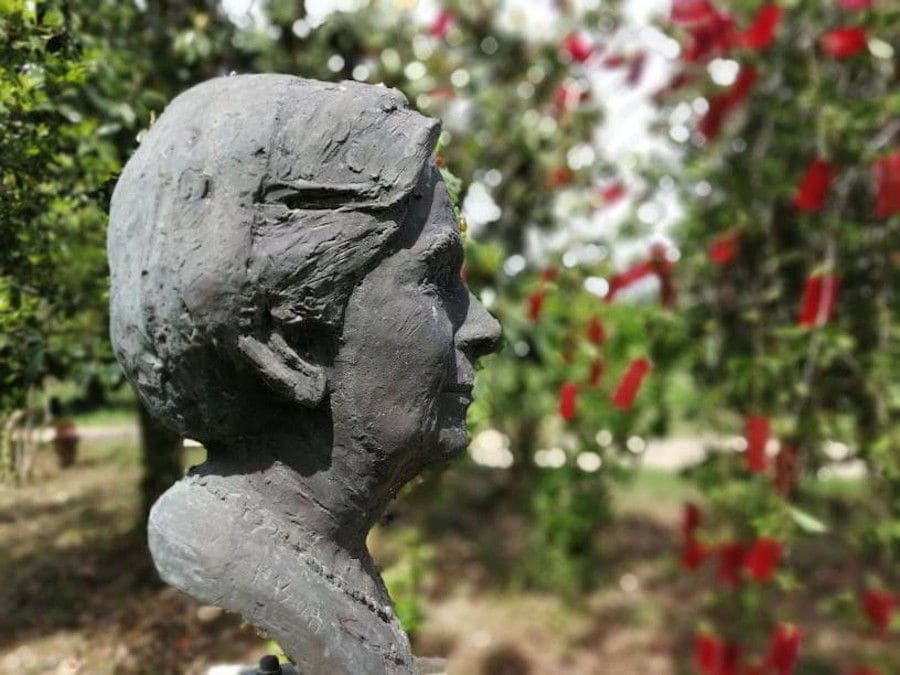 plaster woman bust at 'Mercouri Estate' garden