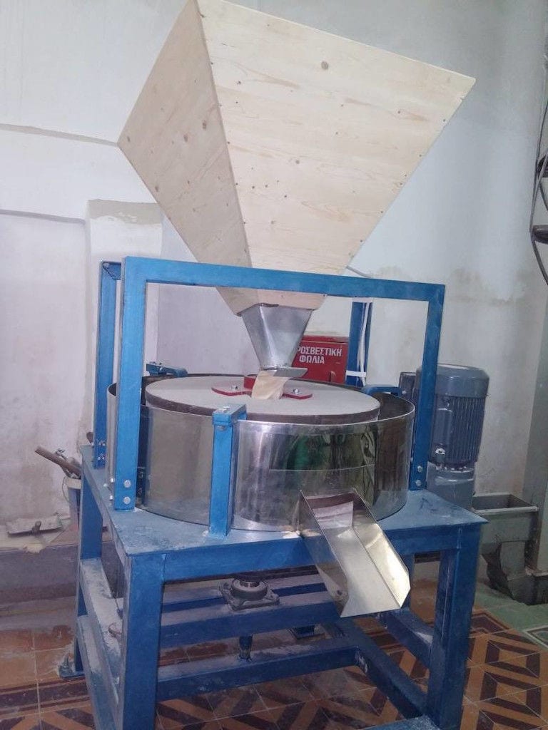 manual bag filling packaging machine at 'Pantazis Stone Flour Mill' facilities