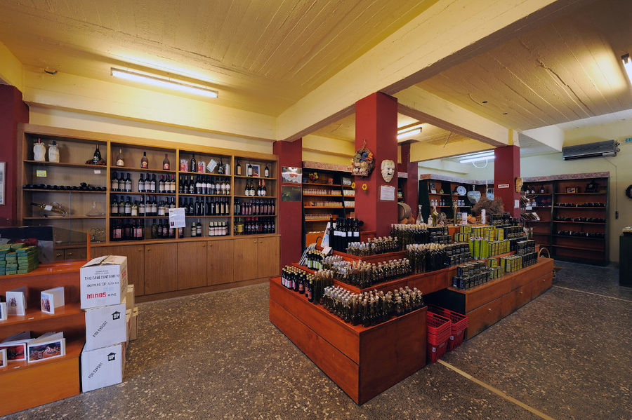 Minos - Miliarakis Winery store with bottles of wine on shelves