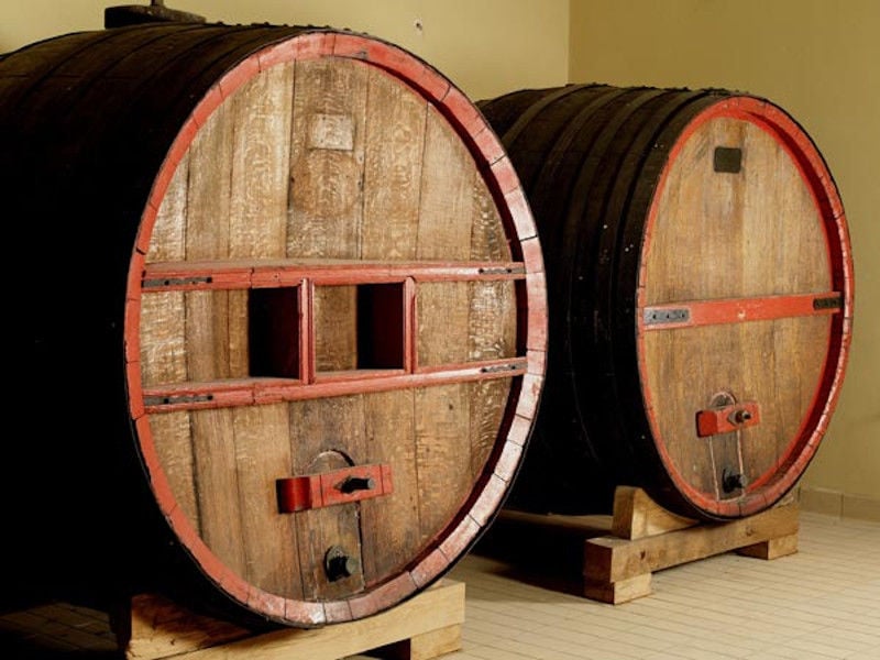 two wine barrels on the wood panels at Nemeion Estate cellar