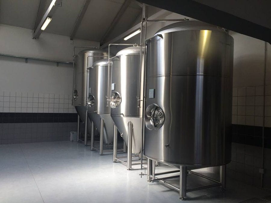 aluminum beer tanks at Noctua Brewery plant