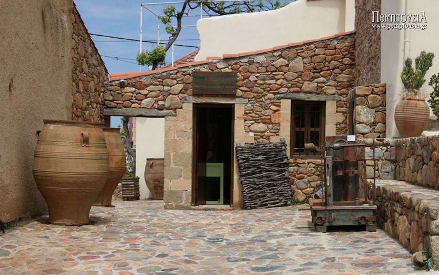 'Olive and Olive Oil Museum, Sparta' stone building outside with ceramic amphoras
