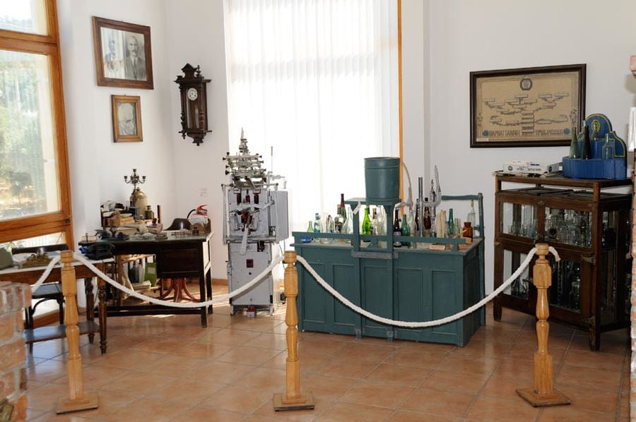 antique tables and cabinet with old exxibits at Ouzo Barbayanni museum