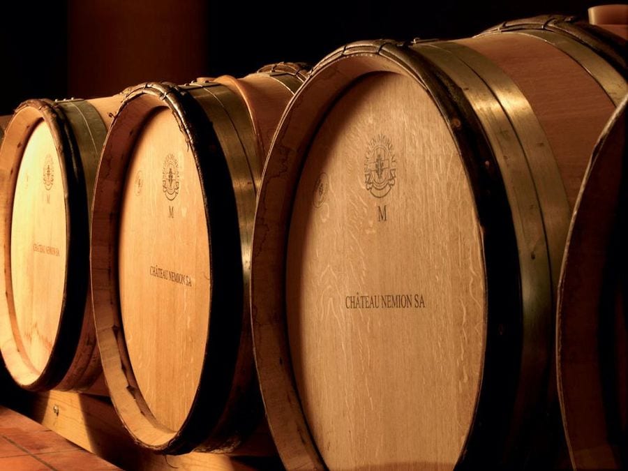 personalized wooden wine barrels sign with the CHATEAU NEMEION SA into the cellar