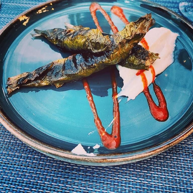 plate with 2 fried fish and a dollop of ketchup at Savor Nafplio