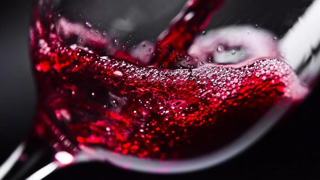 close-up of a glass with red wine blends