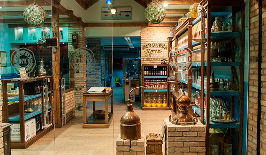 illuminate 'Spentza Distillery' store with drinks bottles on the svelves