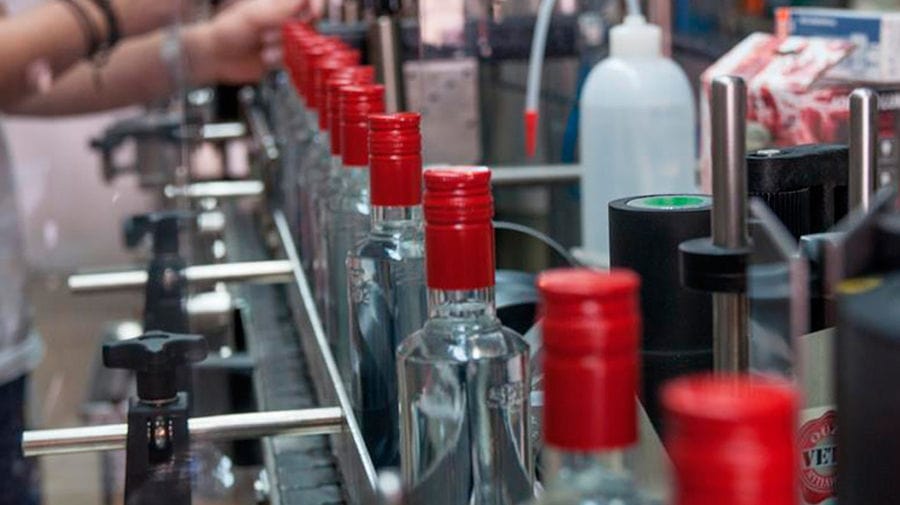 close-up of bottling part of alcohol at distillery equipment spirits at 'Spentza Distillery