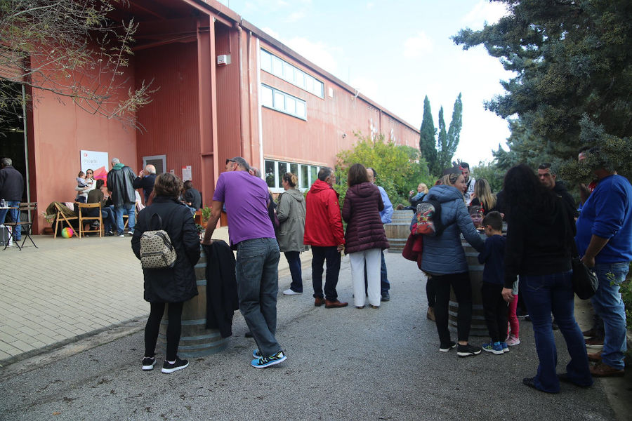 group of tourists waiting at Strofilia winery outside