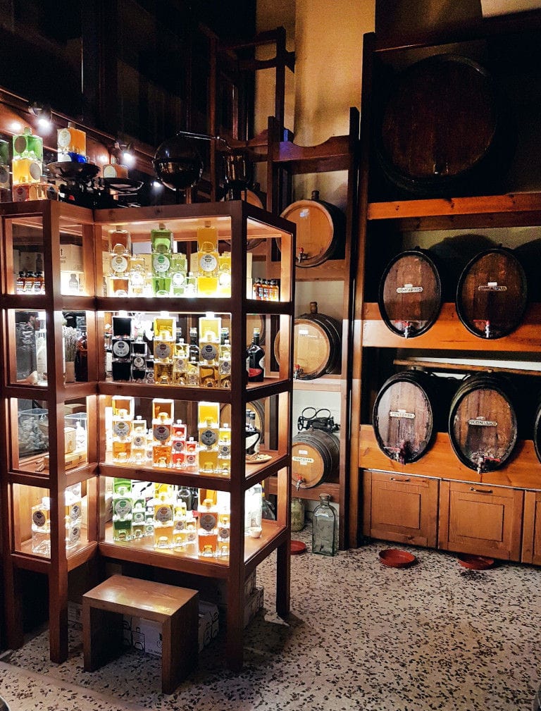 illuminated antique lockers with bottles 'Tentoura Castro Distillery' store