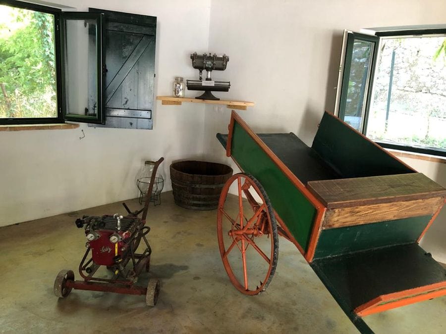 old green cart with two wheels at 'Theotoky Estate'