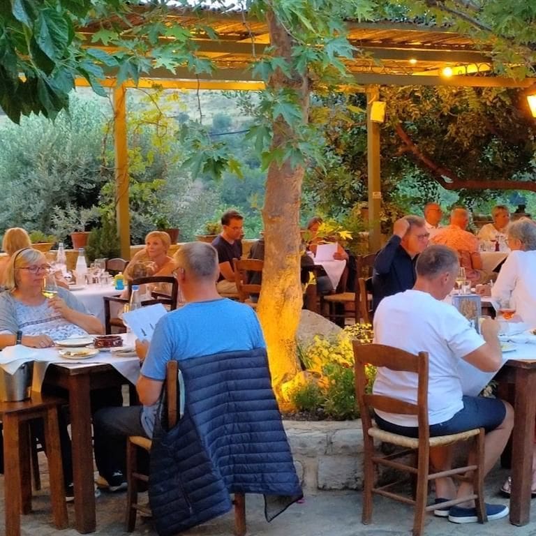 tourists tasting wines and eating aperitifs at Ktima Toplou
