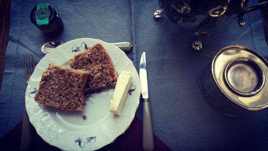 plate with white cheese and two pieces of wheat bread from 'The Trinity Farm'