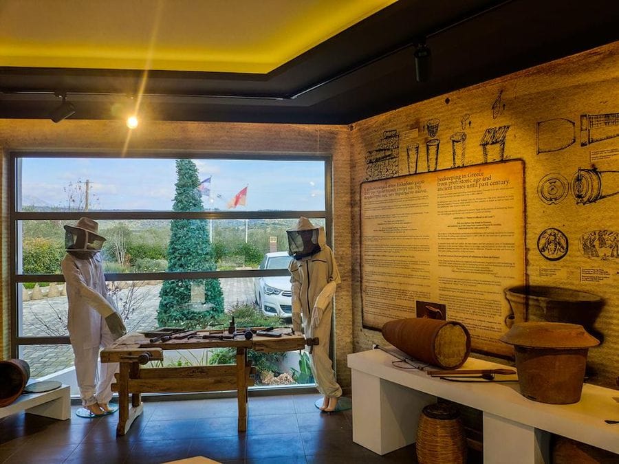 two beekeepers watching at the camera at axion esti museum