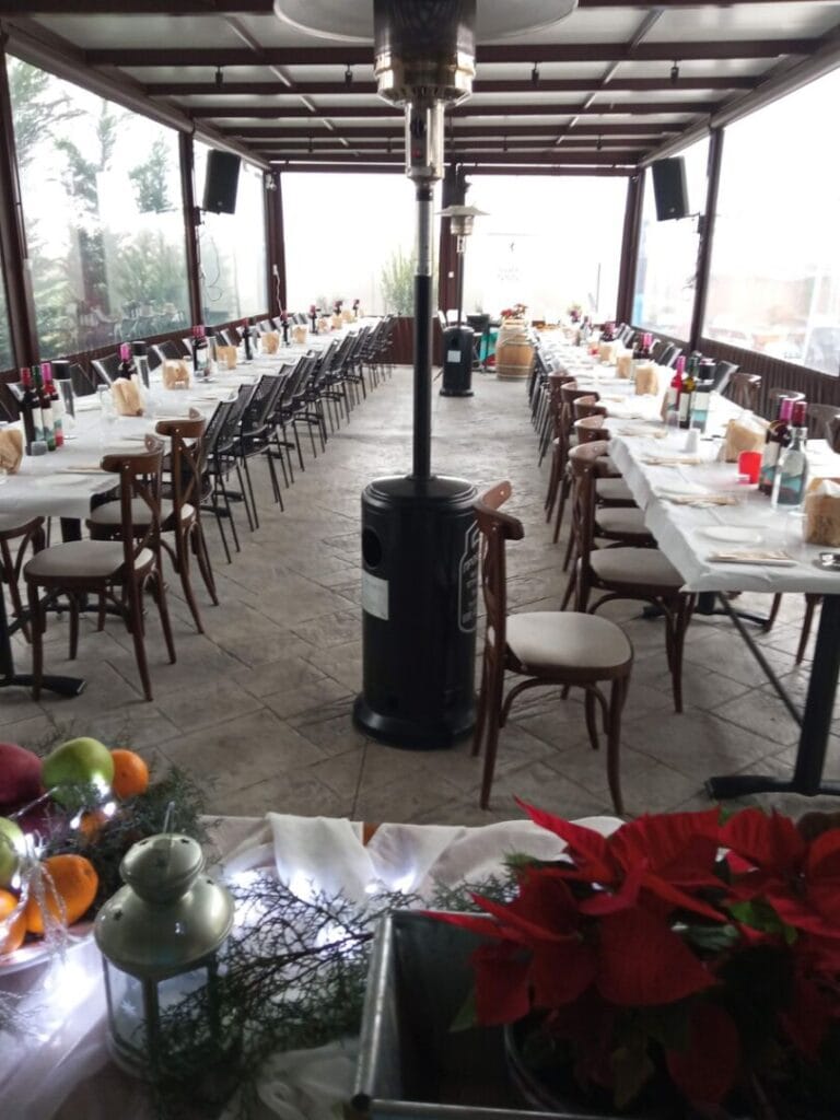 Kappa Winery's restaurant with large tables for wine tasting and two stoves