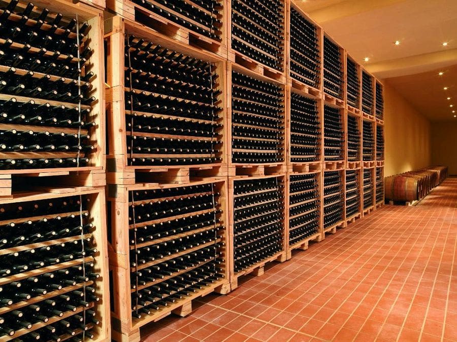 wine bottles on top of each other in the storage locker at Nemeion Estate cellar