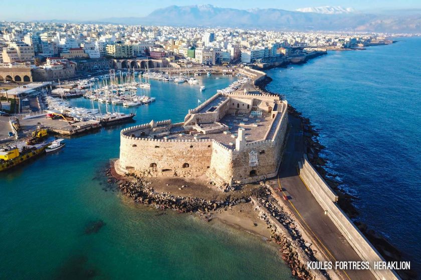 a castle on a rocky island surrounded by water