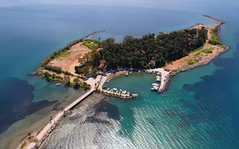 an island with boats and a dock