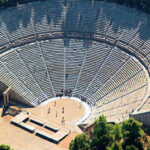 an aerial view of an ancient amphitheater