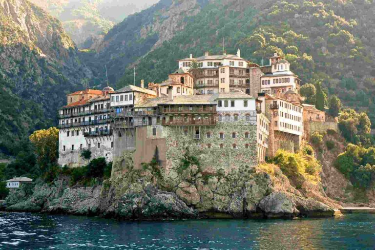 Mount Athos on a cliff above water