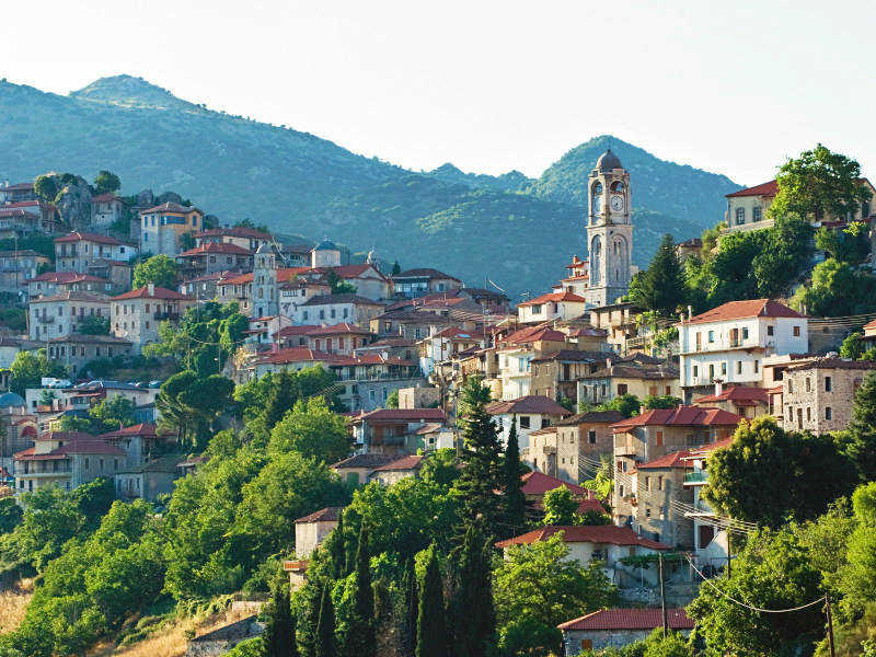 a town with a clock tower on the top of it