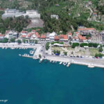 aerial view of a city and a body of water