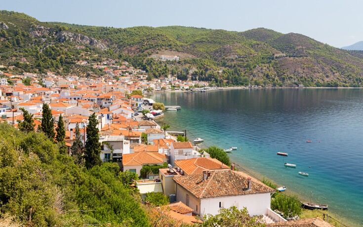 a city next to a body of water