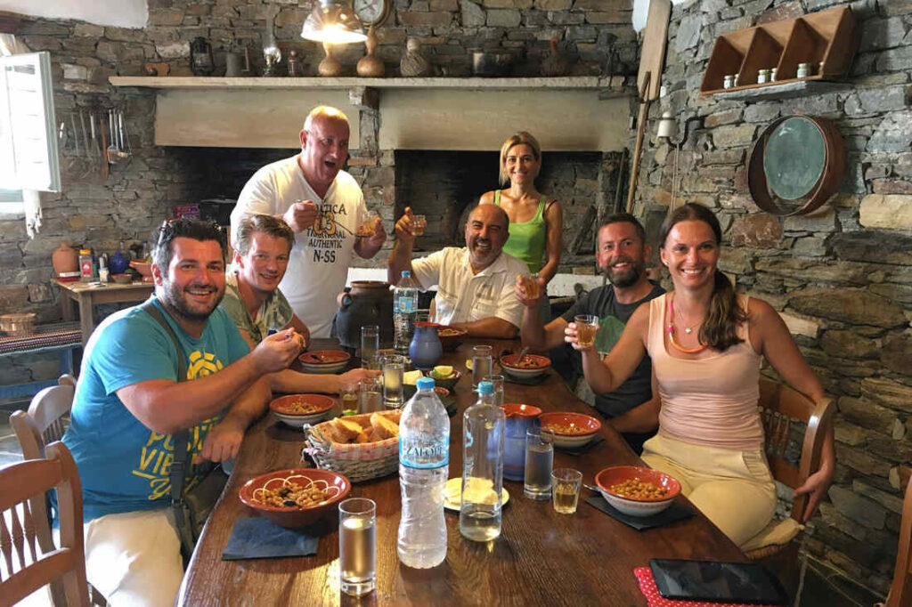 a group of people sitting around a table