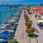 a waterfront with boats and buildings